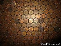 Pennies in the front of the bar
