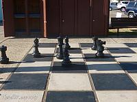 Several of the black chess pieces from the Morro Bay Chess Set