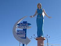 Blue Angel Statue and Motel Sign